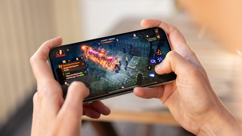 A person playing Diablo Imortal on an Apple iPhone 15 A person playing Diablo Imortal on an Apple iPhone 15