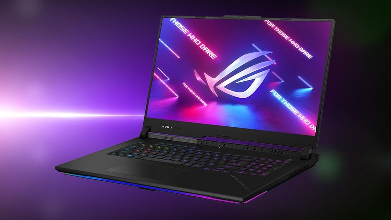 ASUS ROG Strix Scar 17 Gaming-Laptop mit bunten Lichtern und 'FÜR DIE, DIE WAGEN' auf dem Bildschirm. ASUS ROG Strix Scar 17 Gaming-Laptop mit bunten Lichtern und 'FÜR DIE, DIE WAGEN' auf dem Bildschirm.